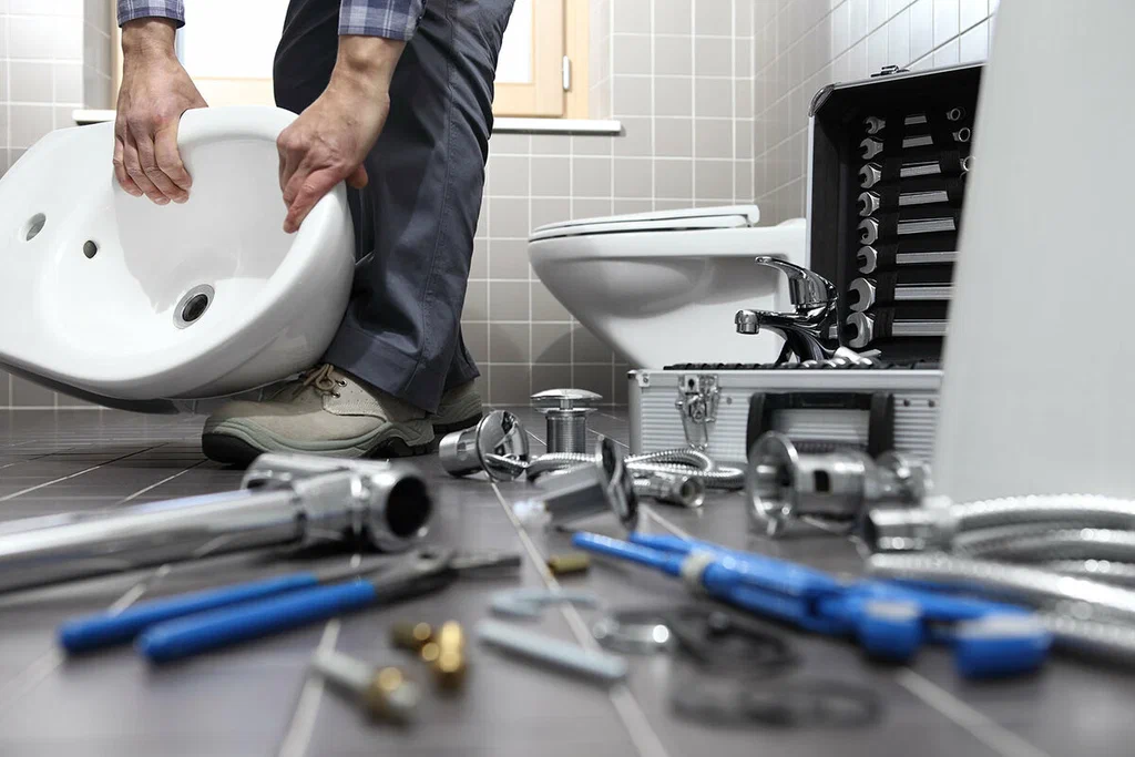 Plumbing tools prepared for a bathroom repair in Cheltenham
